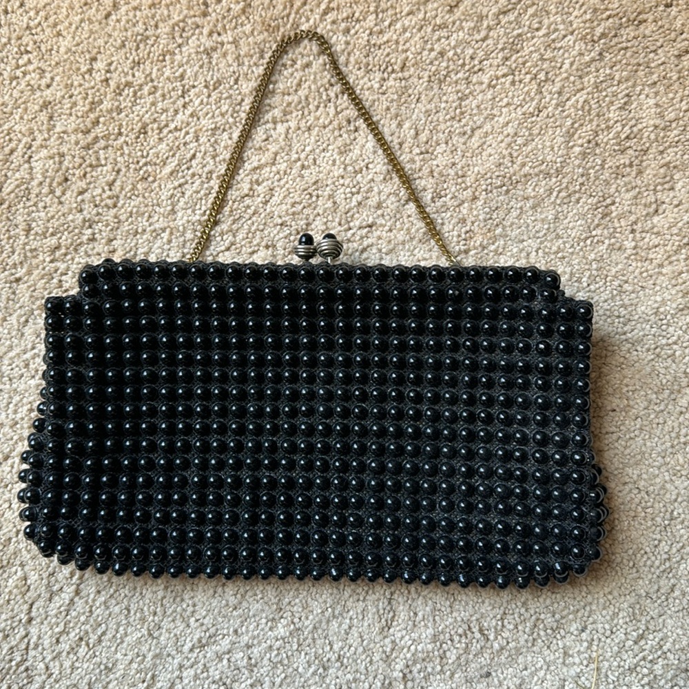 1960’s beaded clutch. Can be worn as a bag with the inner chain.